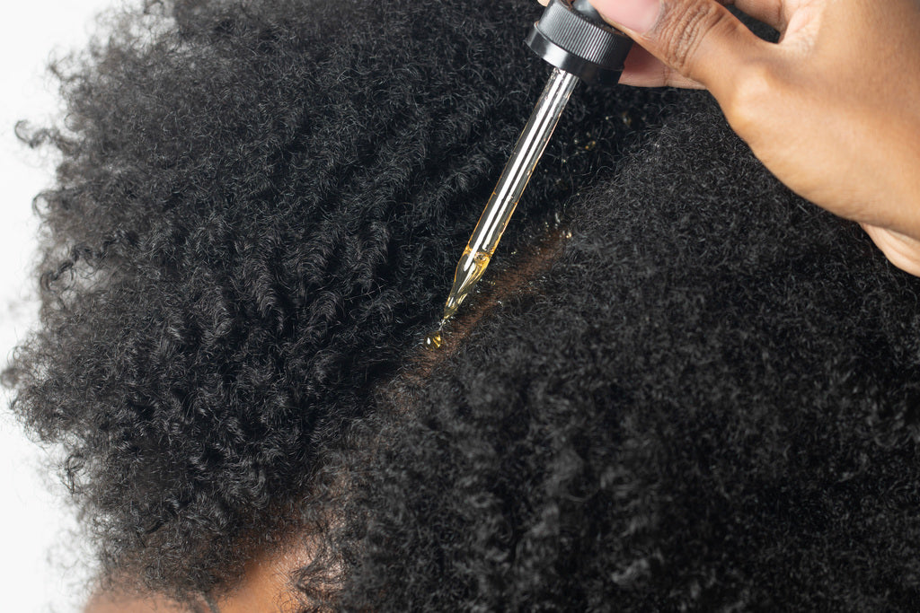 Haitian Castor Oil On Textured Hair